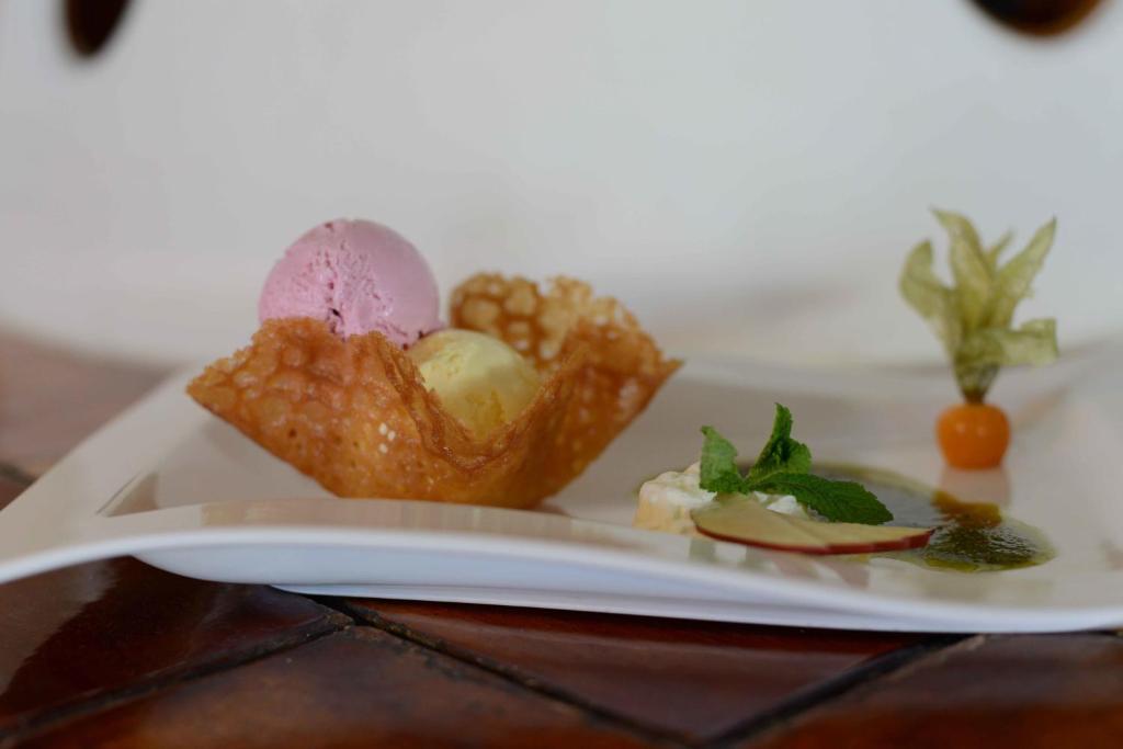 a plate of food with ice cream on it at Alpengasthof zur Post in Schattwald