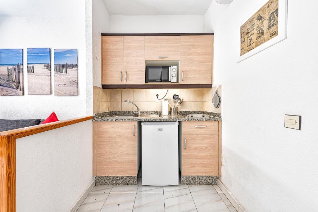 Kuchyň nebo kuchyňský kout v ubytování DUPLEX en PARAÍSO