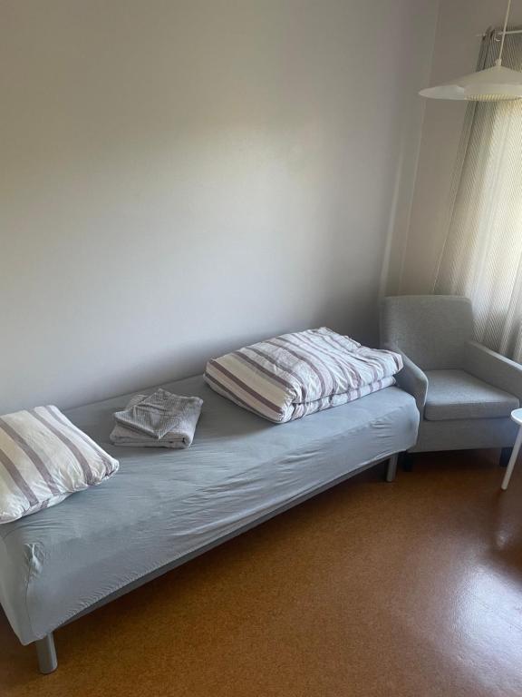 Postel nebo postele na pokoji v ubytování Harran Gjestehus