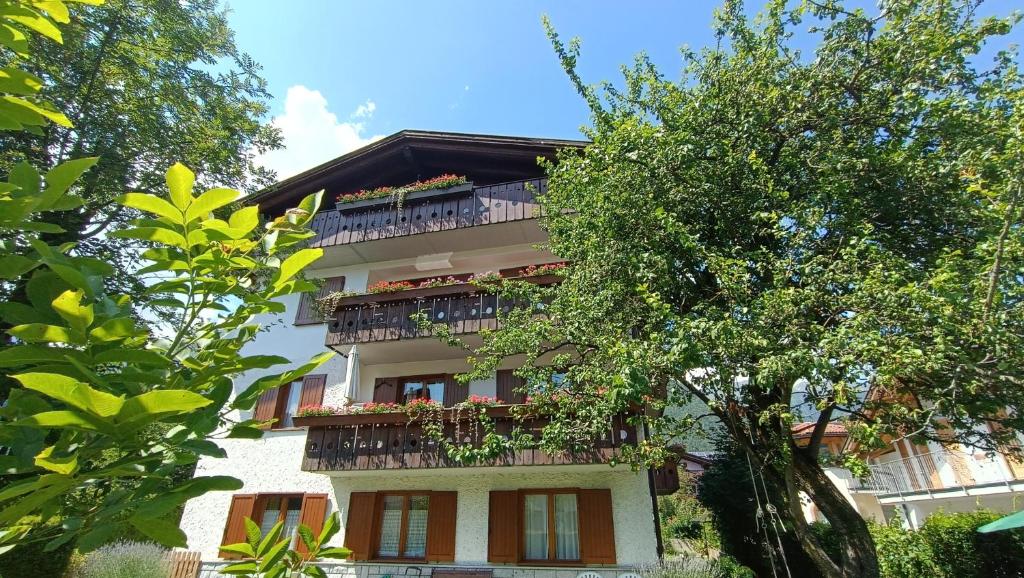 a building with balconies on the side of it at Casa Natalie in Pinzolo