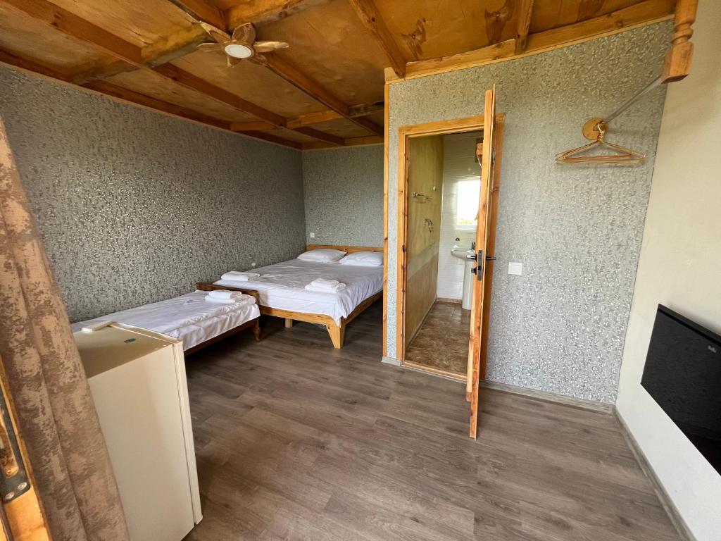 Postel nebo postele na pokoji v ubytování Forest INN