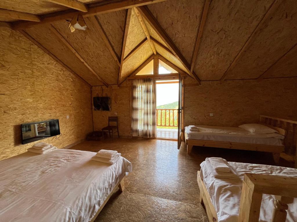 Postel nebo postele na pokoji v ubytování Forest INN