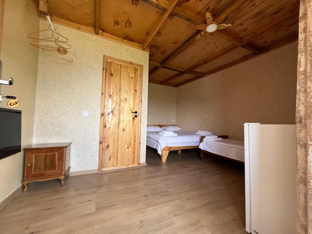 Postel nebo postele na pokoji v ubytování Forest INN