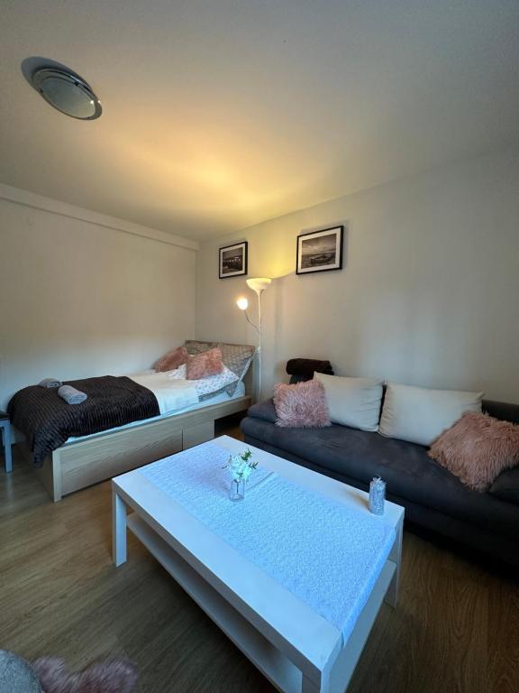 เตียงในห้องที่ Nadmorski Apartament Nowy Port