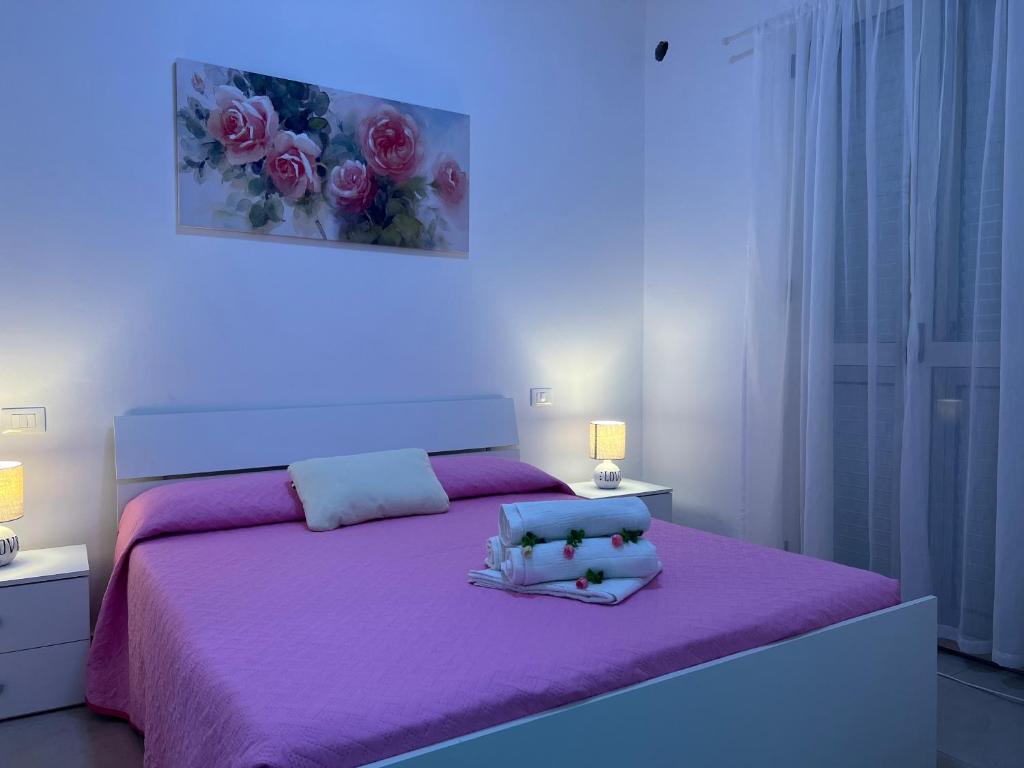 Łóżko lub łóżka w pokoju w obiekcie B&B Volì Club