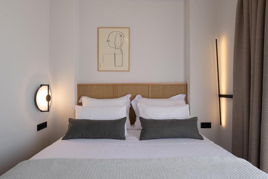 Postel nebo postele na pokoji v ubytování Sun rise Villas ammouliani