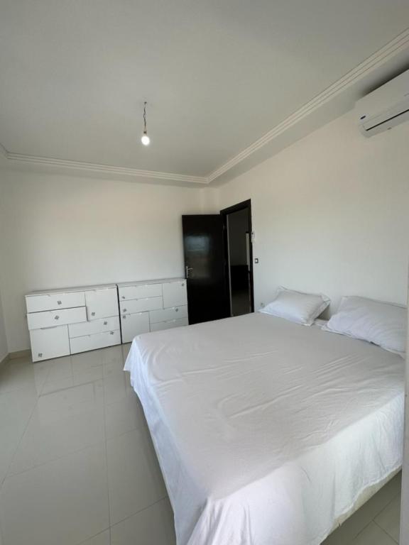 Postel nebo postele na pokoji v ubytování Nouveau Appartement Familiale - Résidence Calme