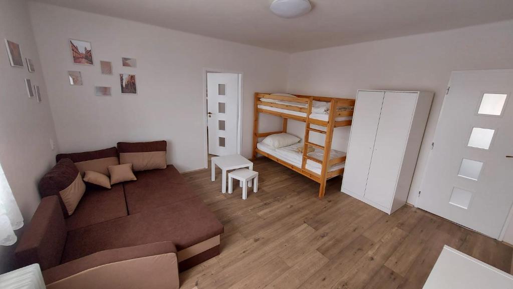 Postel nebo postele na pokoji v ubytování Apartmán Velehrad