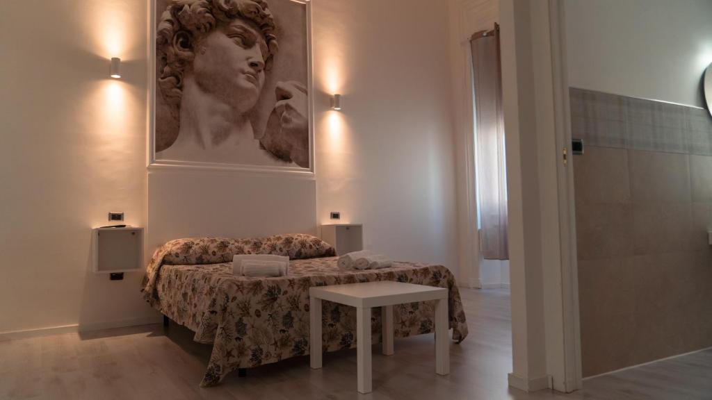 Postel nebo postele na pokoji v ubytování B&B Art