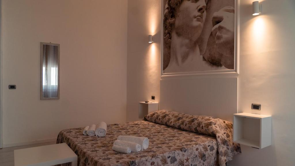 Postel nebo postele na pokoji v ubytování B&B Art