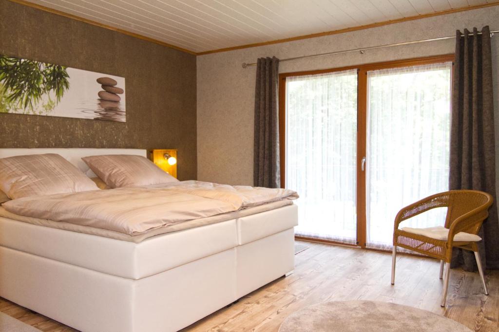 Postel nebo postele na pokoji v ubytování Basaltikum