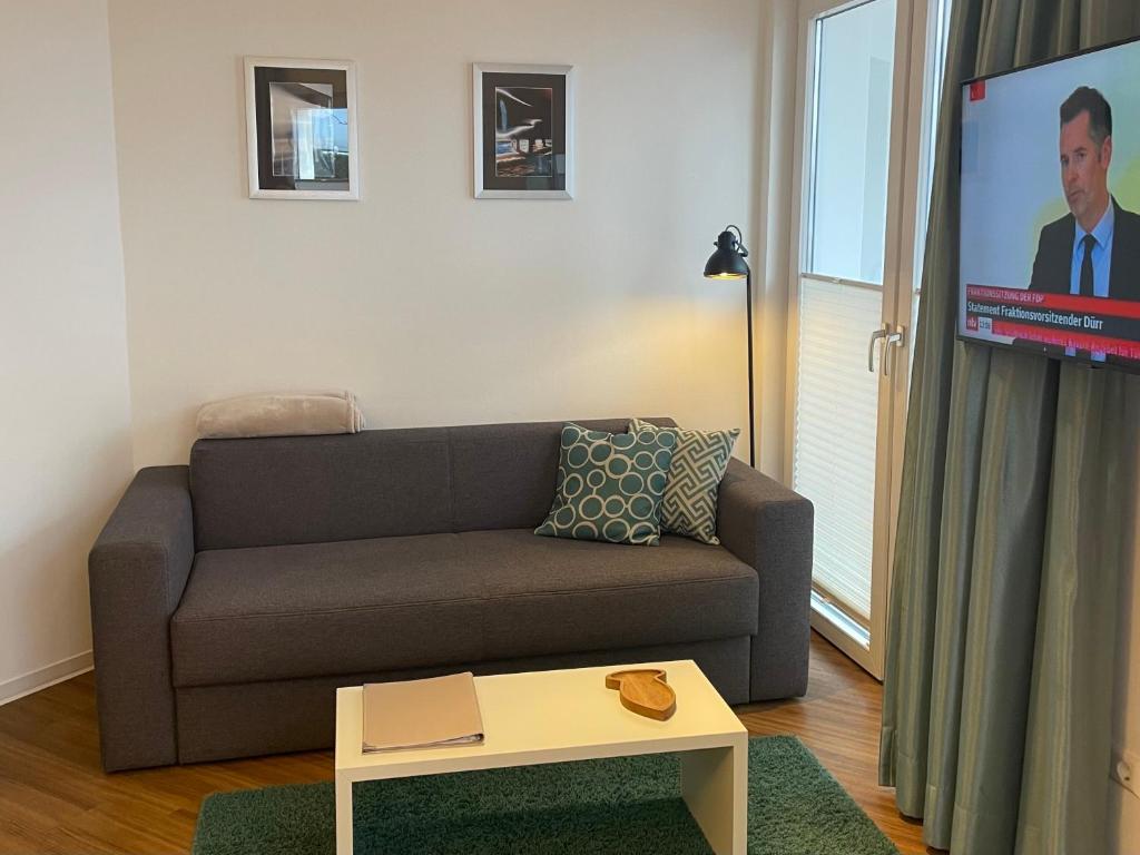 Televiisor ja/või meelelahutuskeskus majutusasutuses Apartments Boardinghaus Norderney