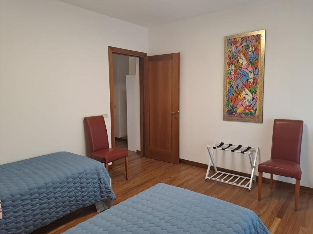 Postel nebo postele na pokoji v ubytování Il posto Giusto