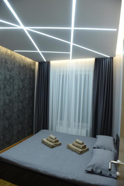 Postel nebo postele na pokoji v ubytování Premium Lux Apartman Čačak