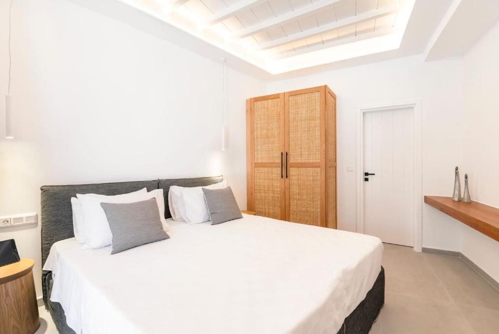 Łóżko lub łóżka w pokoju w obiekcie Villa Zen - MG Villas Mykonos