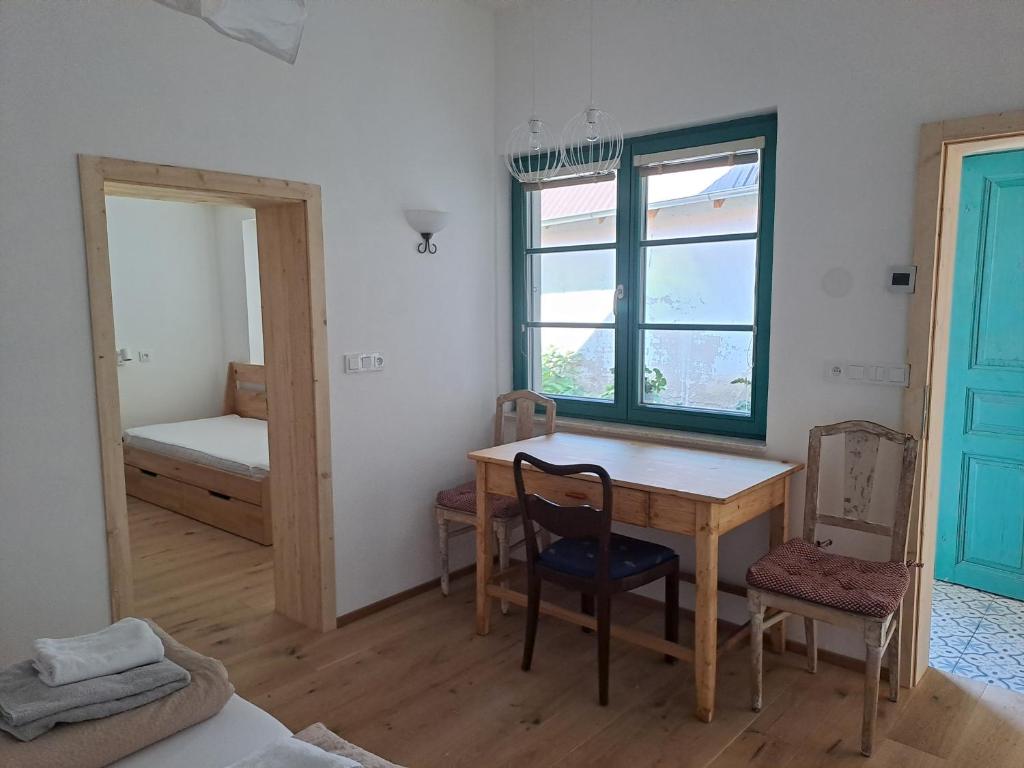 Postel nebo postele na pokoji v ubytování Mirabelka Rakvice