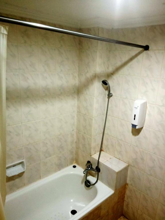 Koupelna v ubytování Puri Mega Hotel