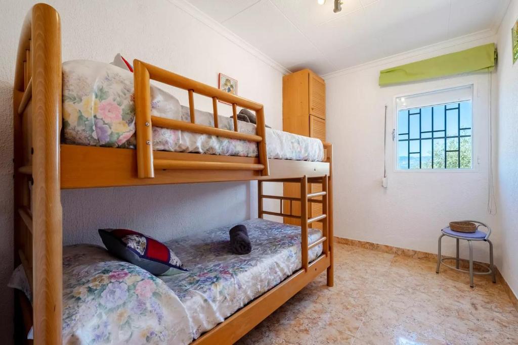 Postel nebo postele na pokoji v ubytování La caseta dels iaios