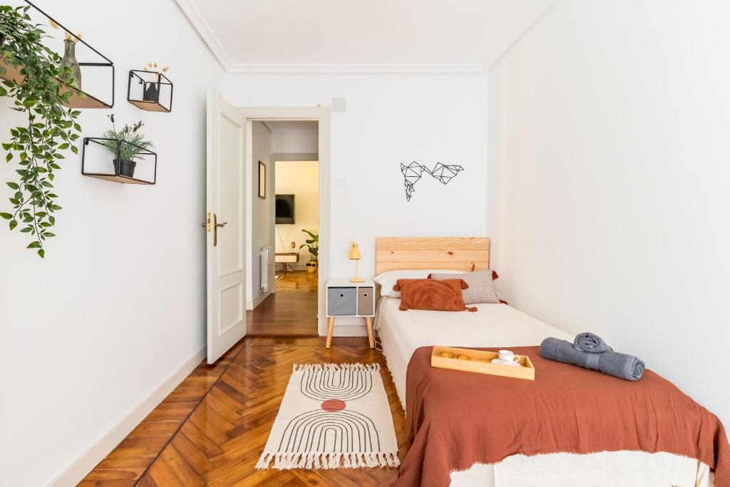 Postel nebo postele na pokoji v ubytování Moderno apartamento en pleno centro