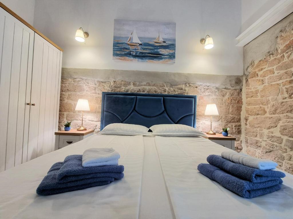 Voodi või voodid majutusasutuse Villa Elena toas