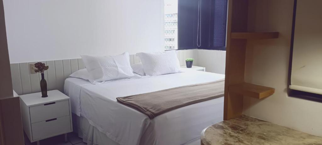 Łóżko lub łóżka w pokoju w obiekcie BOA VIAGEM 2 quartos 100 m da praia até 5 pessoas