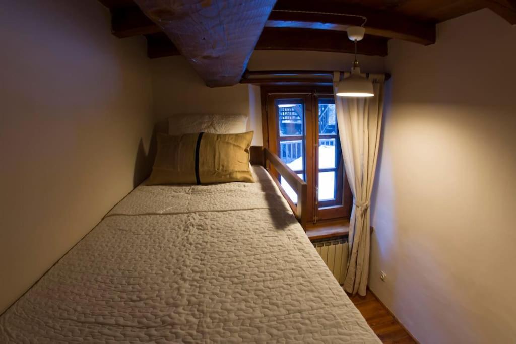 Postel nebo postele na pokoji v ubytování El Tarter - Andorra