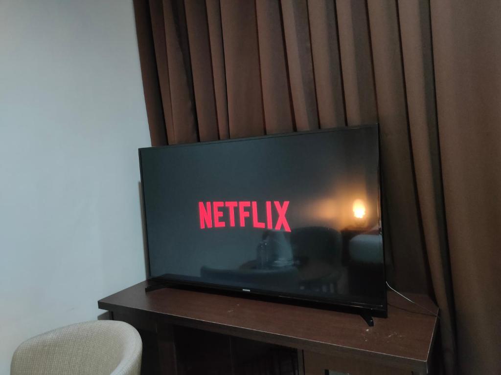 TV a/nebo společenská místnost v ubytování DULLI TRANSIENT HOUSE