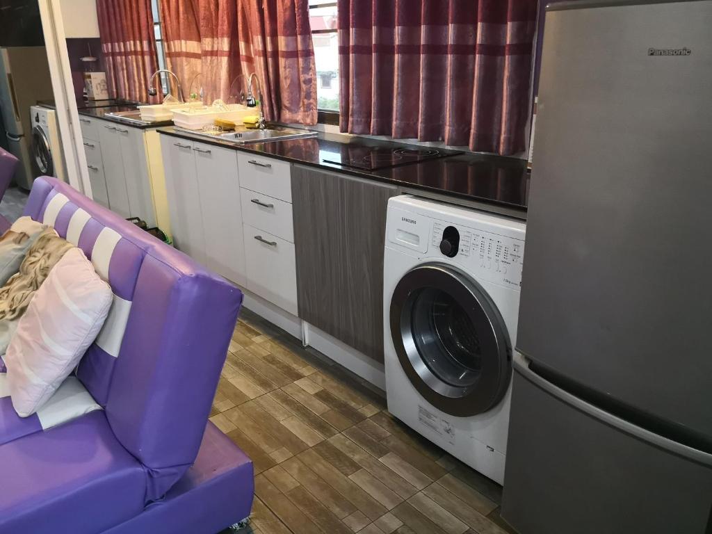 Kuchyň nebo kuchyňský kout v ubytování Jomtien Hill Resort Pratamnak