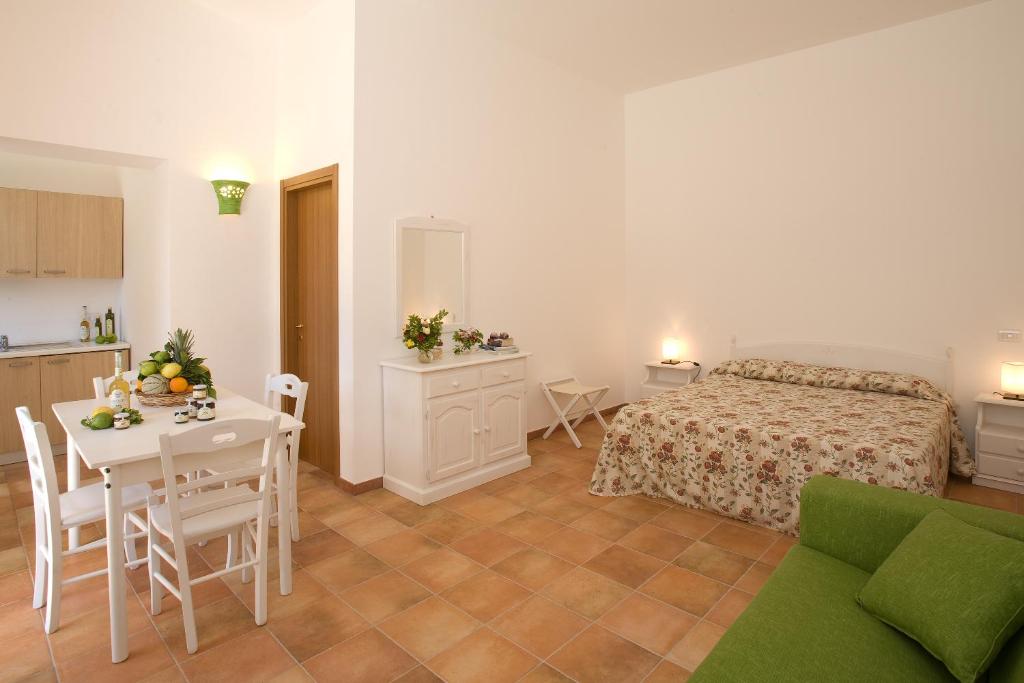 Postel nebo postele na pokoji v ubytování La Casa delle Monache Country Resort