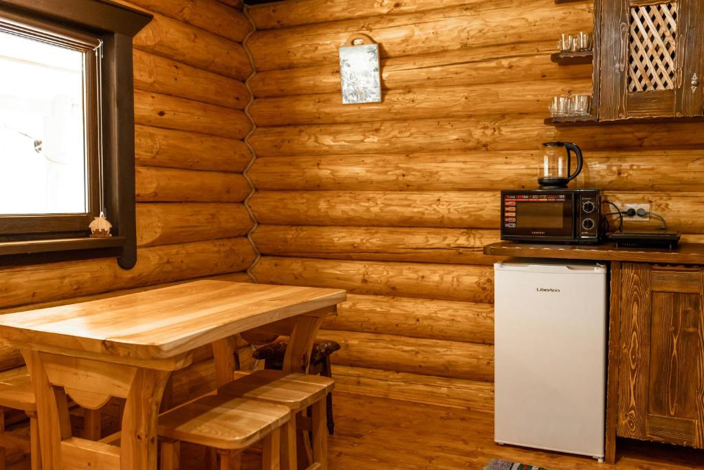 Kuchyň nebo kuchyňský kout v ubytování Шепіт Карпат