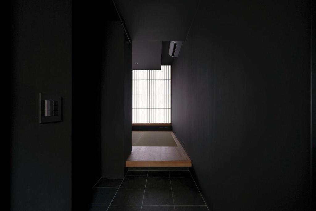 Postel nebo postele na pokoji v ubytování 藤華/京都