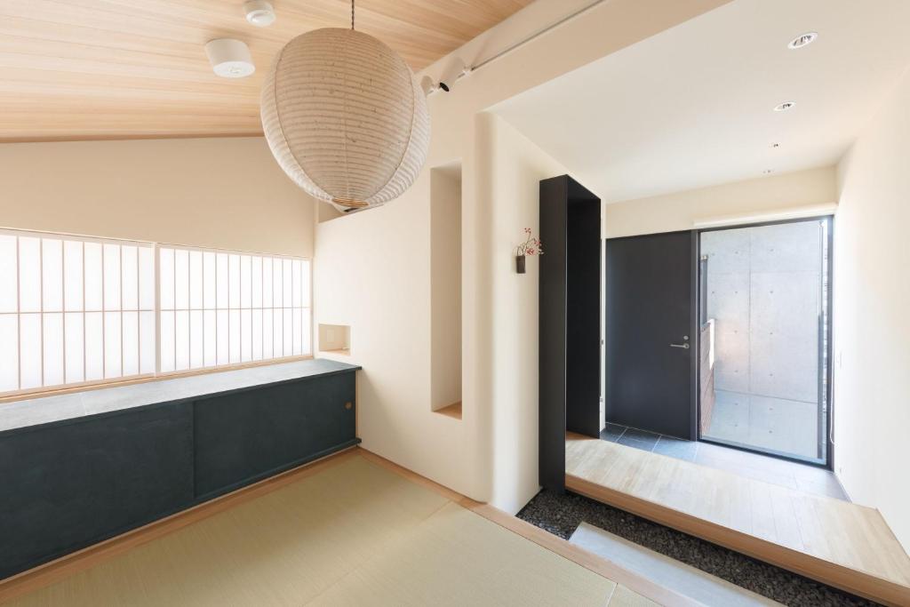 Postel nebo postele na pokoji v ubytování 藤華/京都