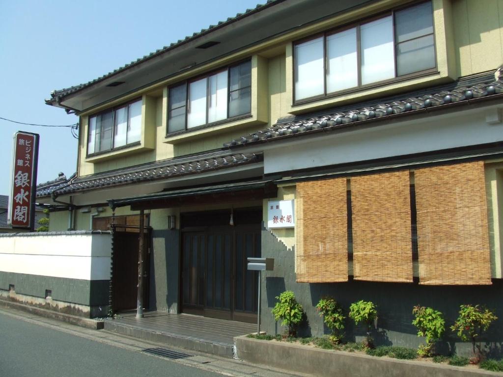 a building on the side of a street at Ryokan Ginsuikaku - Vacation STAY 40409 in Maizuru