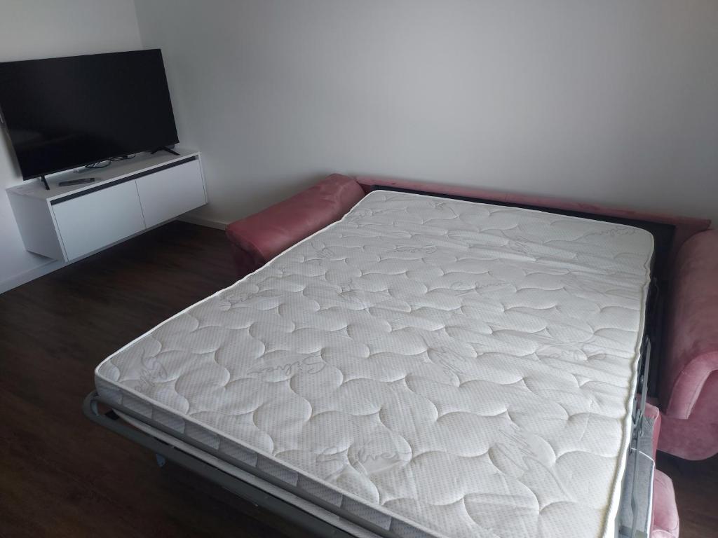 Postel nebo postele na pokoji v ubytování Luxury Apartments Jukić