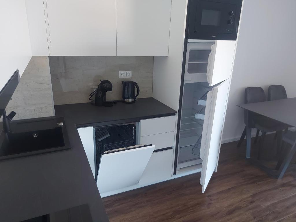 Kuchyň nebo kuchyňský kout v ubytování Luxury Apartments Jukić