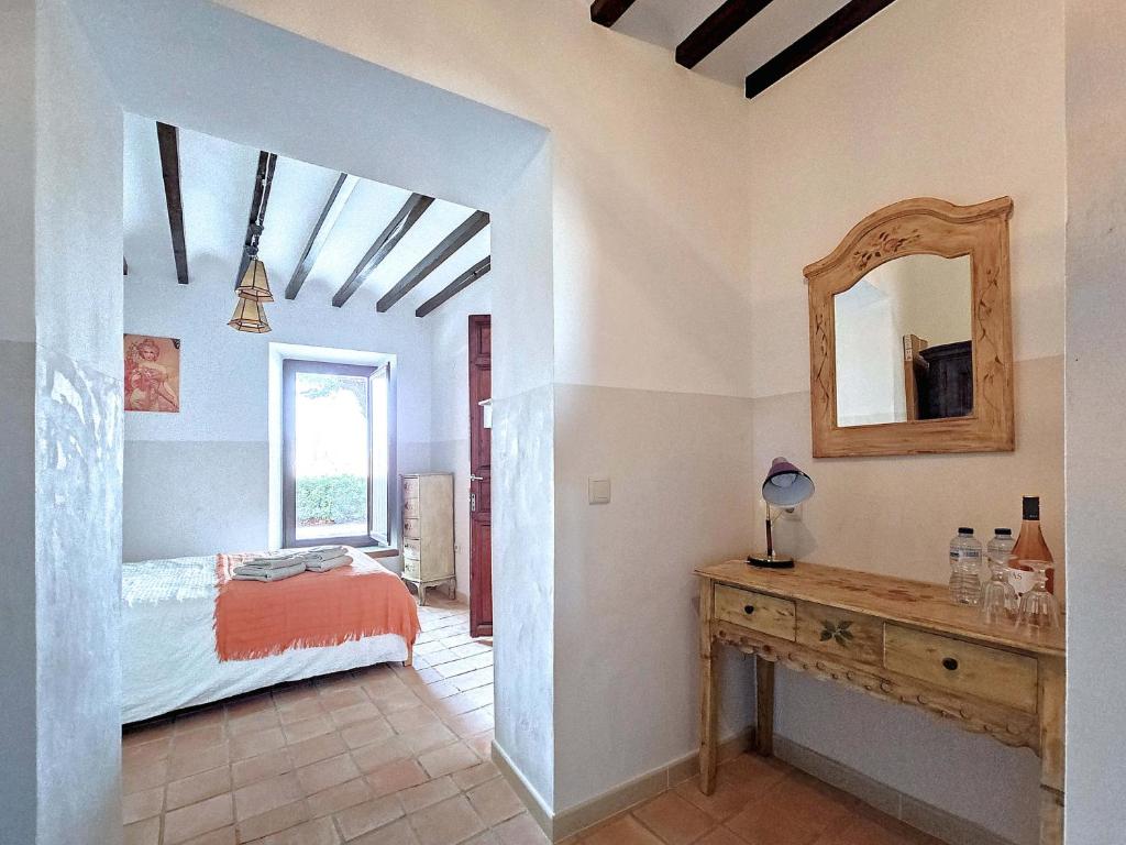 Postel nebo postele na pokoji v ubytování Casa Rodriguillo