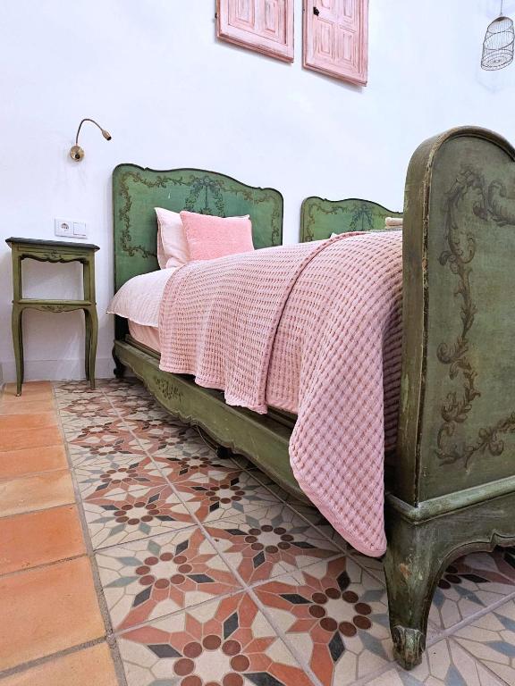 Postel nebo postele na pokoji v ubytování Casa Rodriguillo