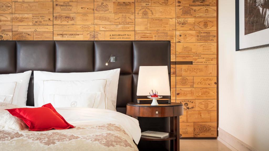 Postel nebo postele na pokoji v ubytování Park Hotel Vitznau