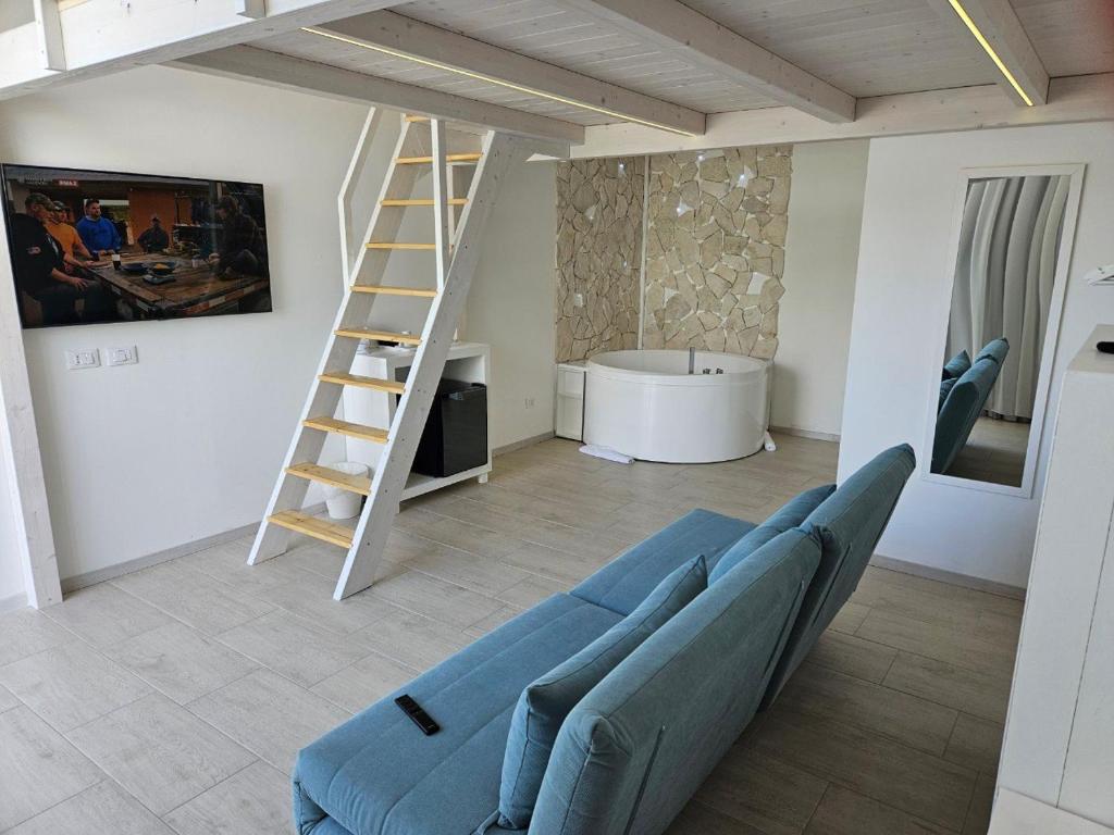 Posezení v ubytování Pool Suite - Città Bianca