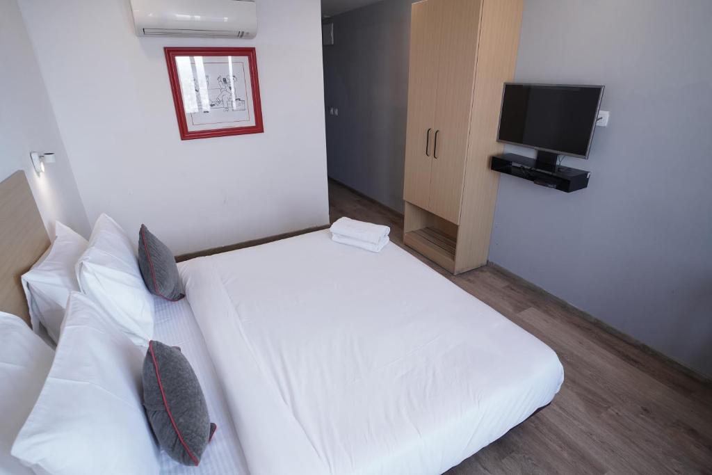 TV a/nebo společenská místnost v ubytování Hotel Sunflare