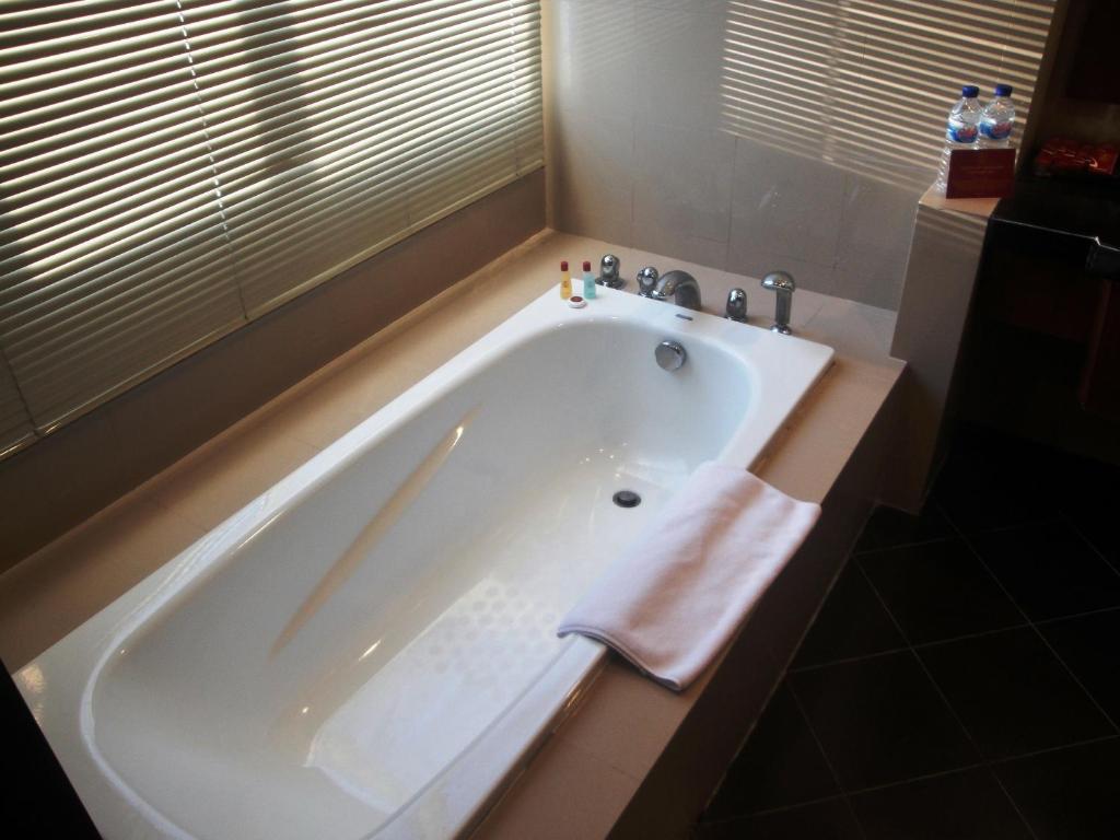 Koupelna v ubytování Manado Quality Hotel
