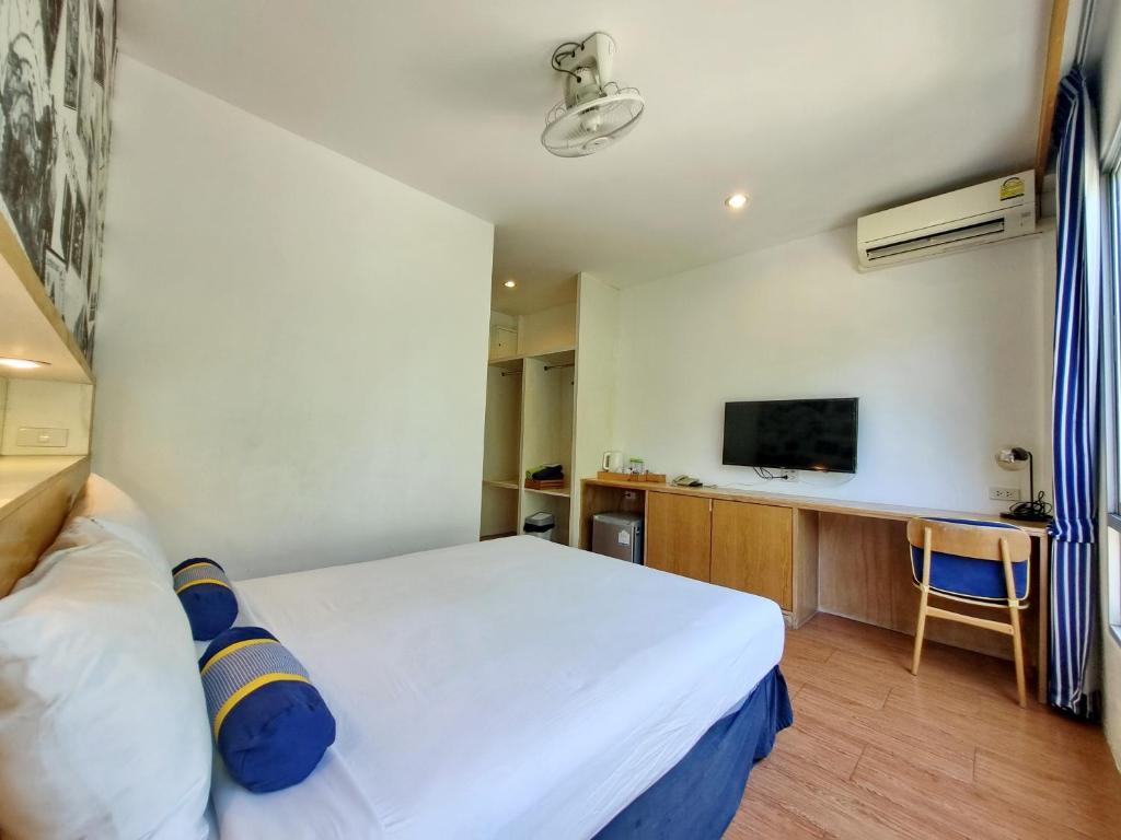 Postel nebo postele na pokoji v ubytování MAR24 Koh Tao Hotel