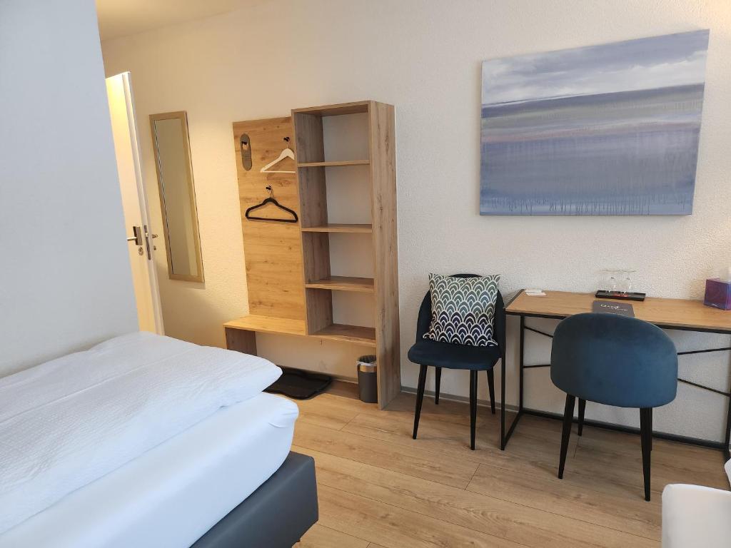 Postel nebo postele na pokoji v ubytování Pension fein & sein