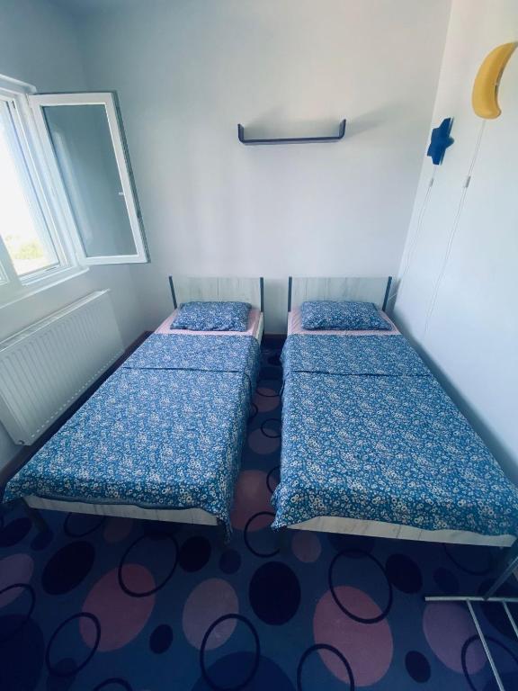 Łóżko lub łóżka w pokoju w obiekcie Island Šolta Comfort apartment Modesty