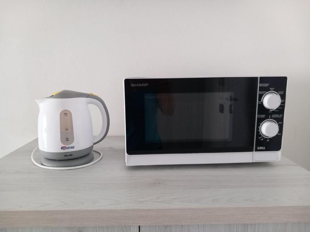 TV a/nebo společenská místnost v ubytování Elegantemare apartment