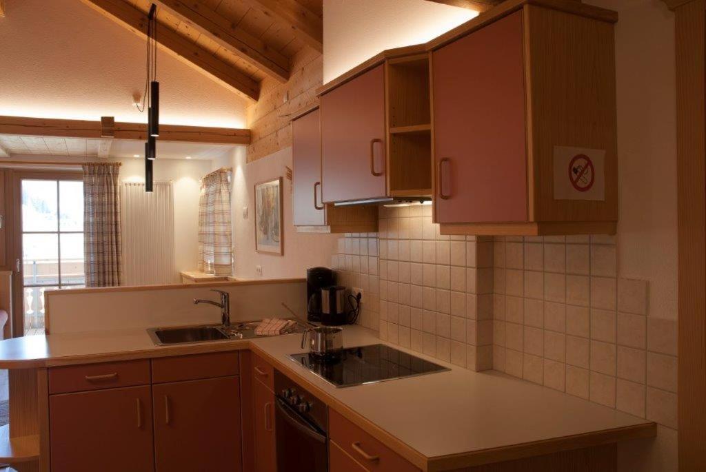Kuchyň nebo kuchyňský kout v ubytování Maurerhof
