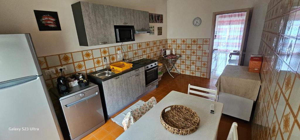Kuchyň nebo kuchyňský kout v ubytování Le Cicas