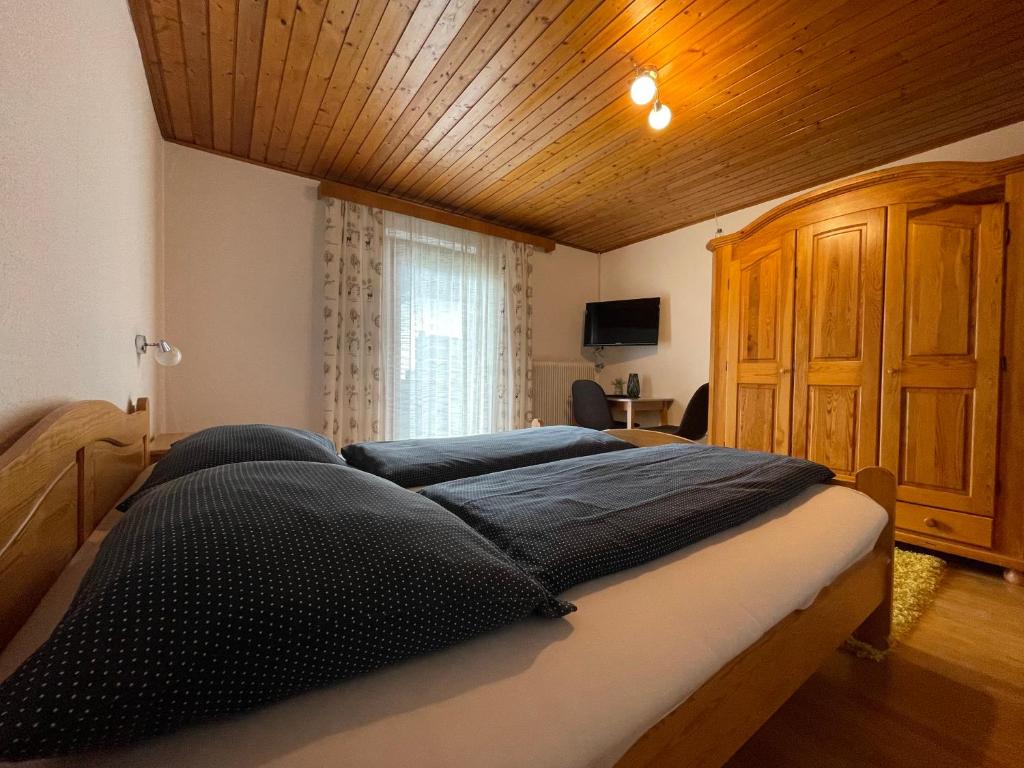Postel nebo postele na pokoji v ubytování Haus St. Martin