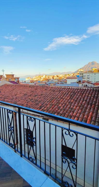 a balcony with a view of a roof at SantOliva Apartments in Trabia