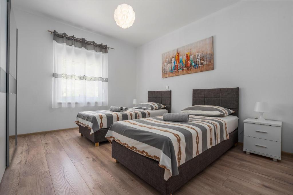 Posteľ alebo postele v izbe v ubytovaní Apartment Campo Verde with a private pool